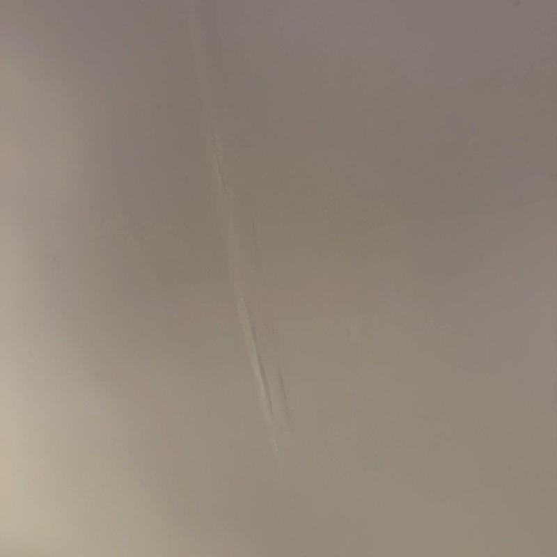 Ceiling drywall crack with water stain damage
