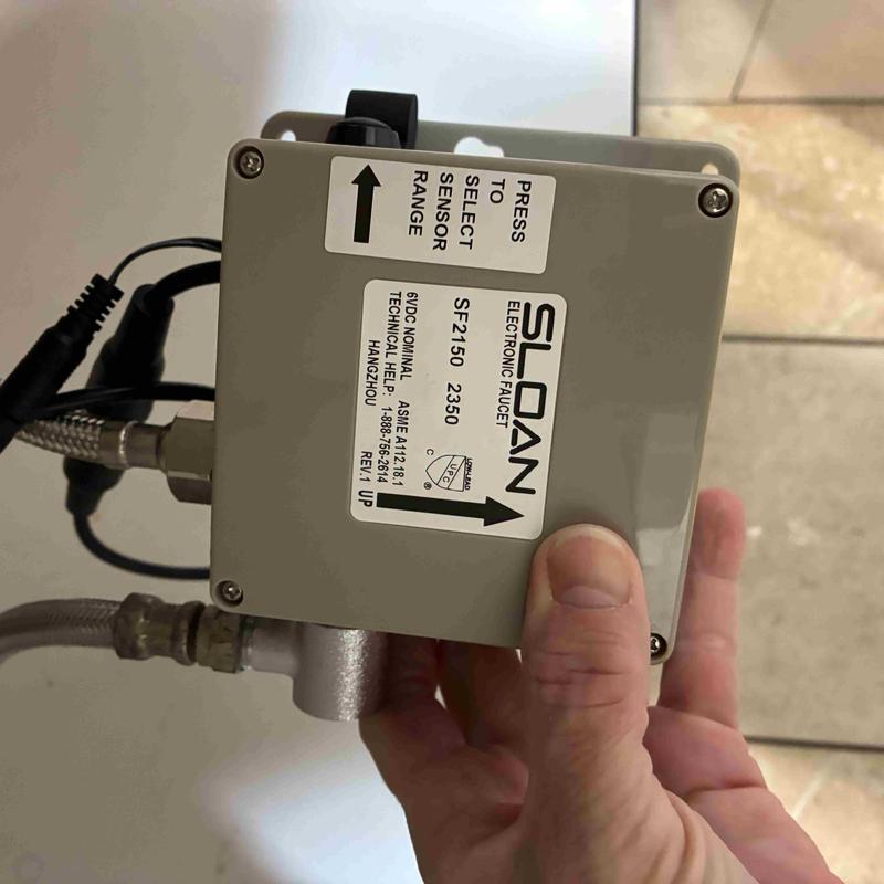 Sloan electronic faucet sensor control unit in hand