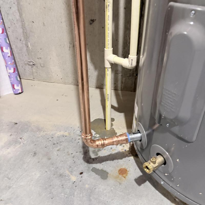 Water heater copper fitting replacement near base Water heater copper fitting replacement near base