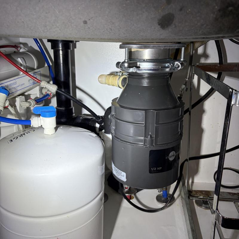 Half horsepower garbage disposal installed under sink Half horsepower garbage disposal installed under sink