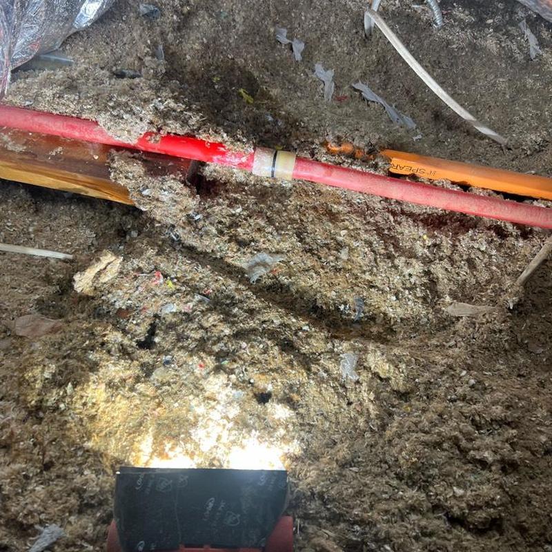 PEX pipe with new couplings in attic insulation