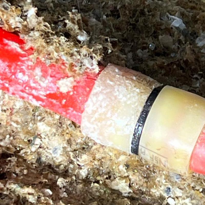 PEX pipe coupling installed in attic ceiling leak repair
