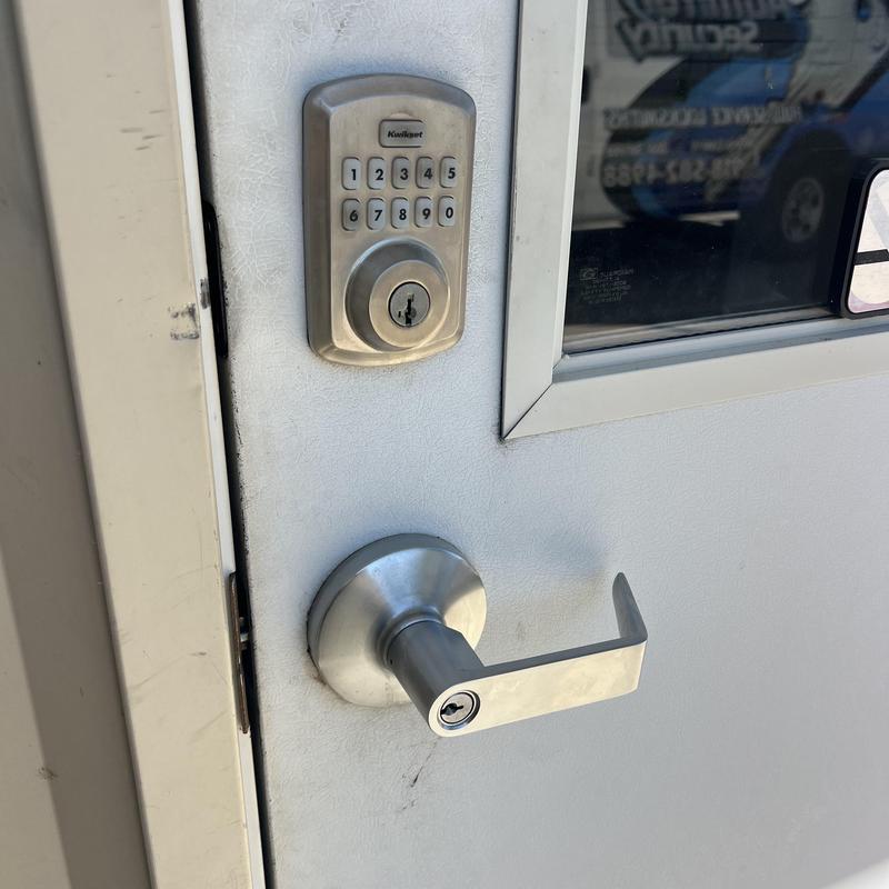 Keypad lock and lever handle on exterior door Keypad lock and lever handle on exterior door