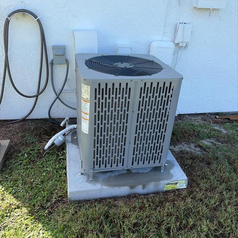Outdoor air conditioner unit on concrete pad Outdoor air conditioner unit on concrete pad