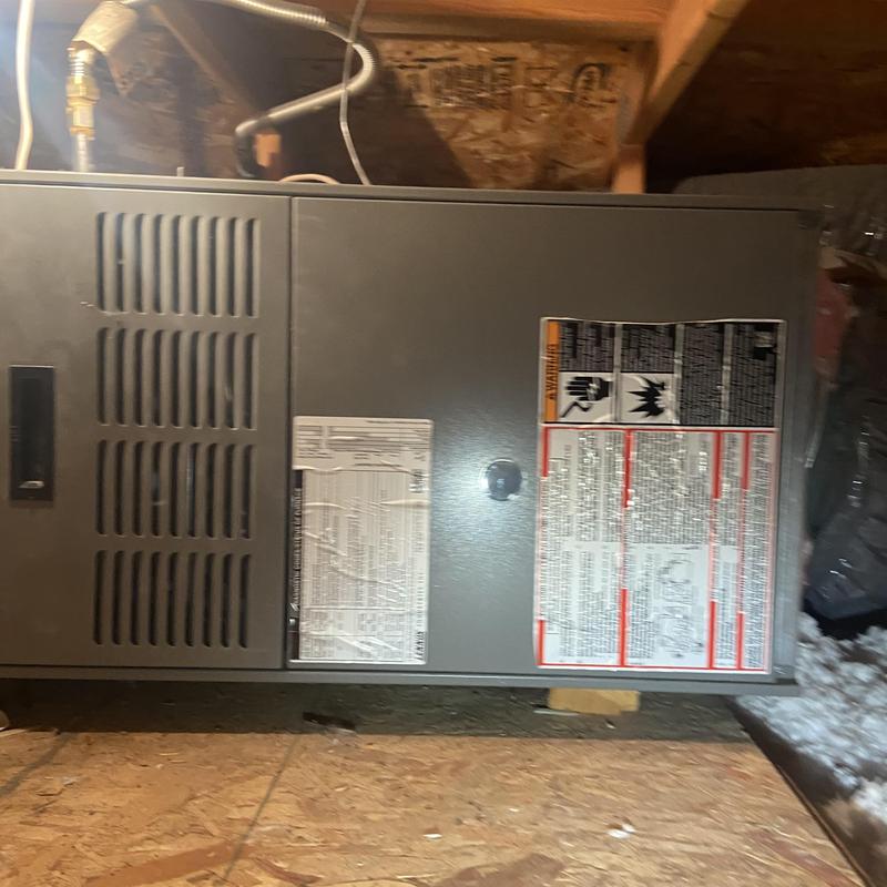 HVAC furnace unit in attic with ventilation ducts HVAC furnace unit in attic with ventilation ducts