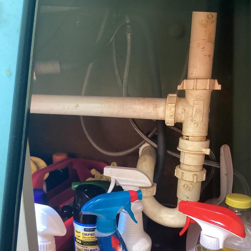 Sink drain pipes with adapter and dishwasher extension installed