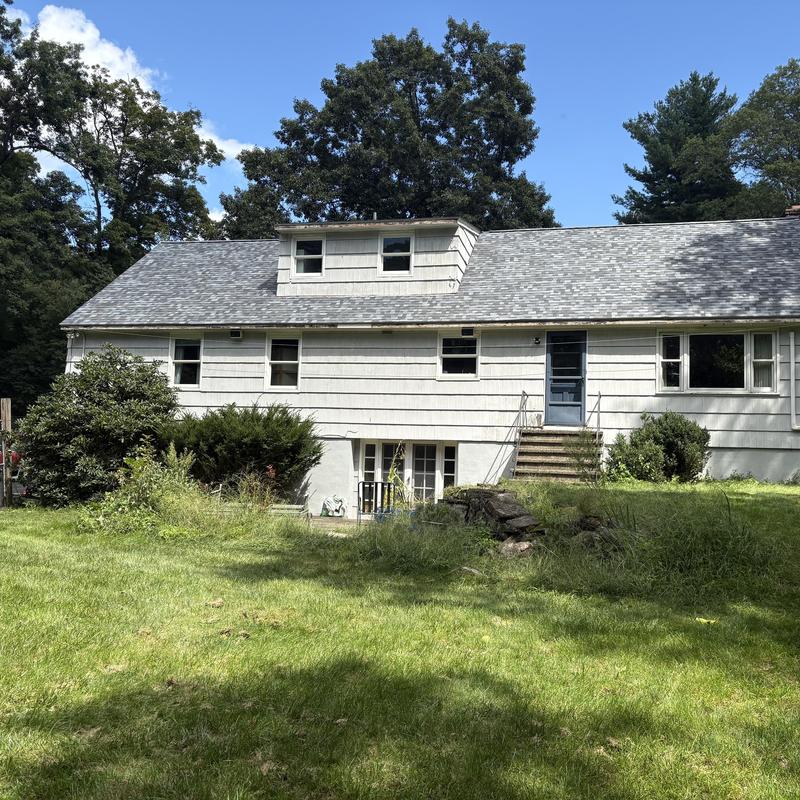 Asphalt shingle roof replacement on residential house Asphalt shingle roof replacement on residential house