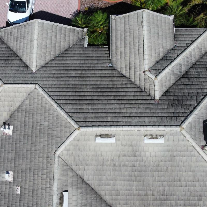 Tile roof with visible wear and discoloration in Hudson FL Tile roof with visible wear and discoloration in Hudson FL