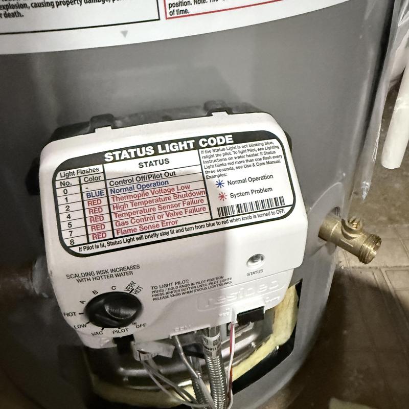 Water heater control panel showing status light codes