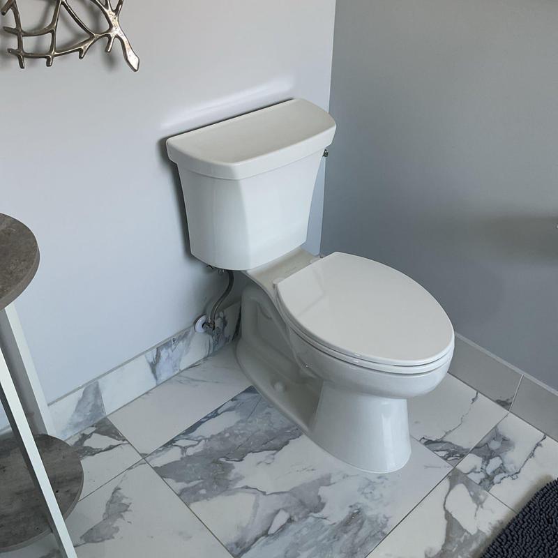Kohler Highline ADA toilet with new flange installed Kohler Highline ADA toilet with new flange installed