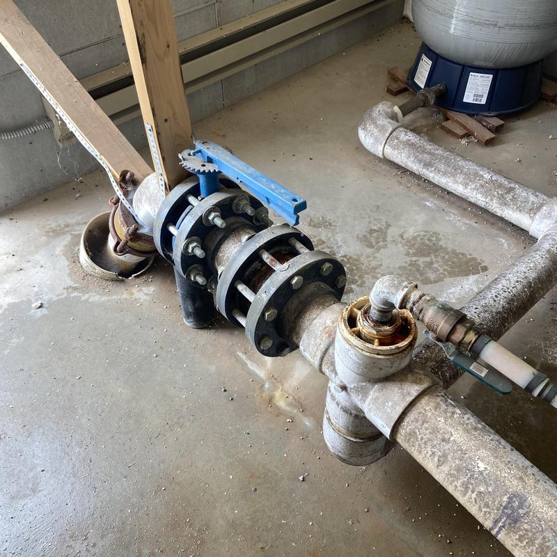 Community well waterline and valve assembly Community well waterline and valve assembly