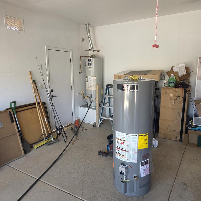 Gas water heater with new drain pan installation
