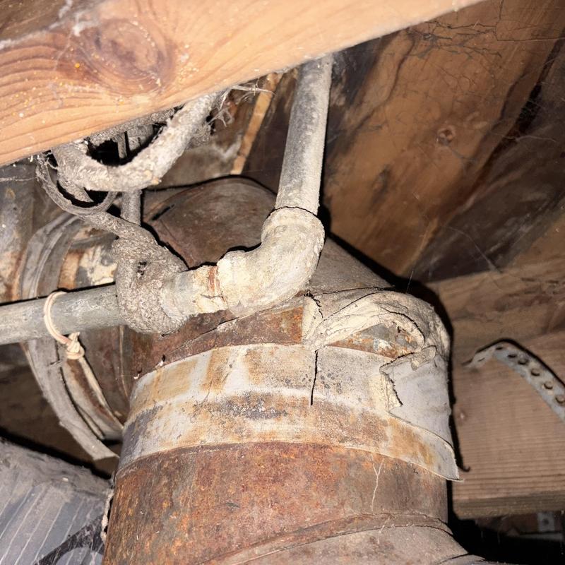 Galvanized water pipe with corrosion and cracking Galvanized water pipe with corrosion and cracking