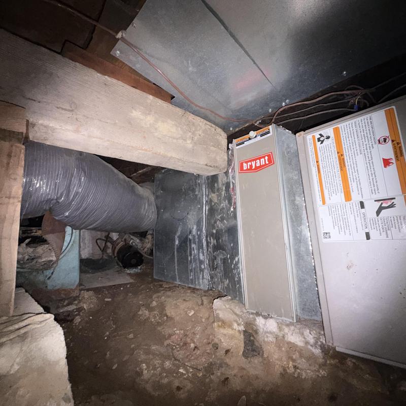 Crawlspace HVAC ductwork with disconnected flexible duct Crawlspace HVAC ductwork with disconnected flexible duct
