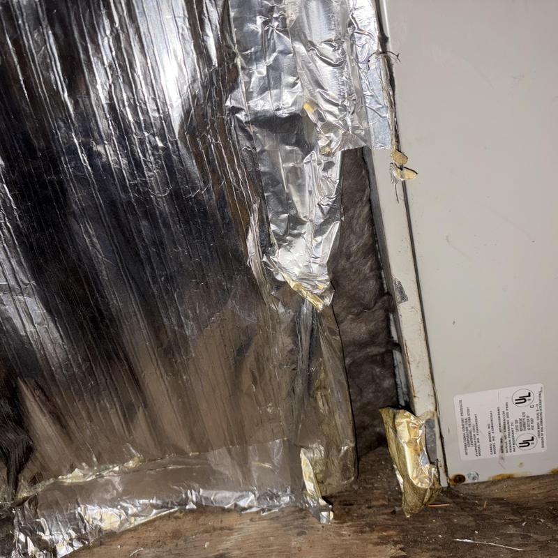 Indoor evaporator coil frozen refrigerant lines with foil insulation Indoor evaporator coil frozen refrigerant lines with foil insulation