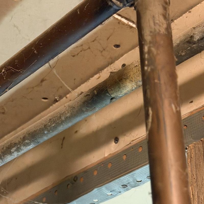 Copper and galvanized pipe corrosion inside wall cavity