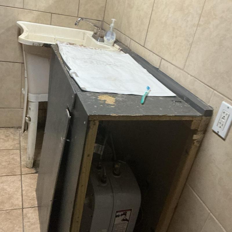 4-gallon Eemax mini water heater installation area