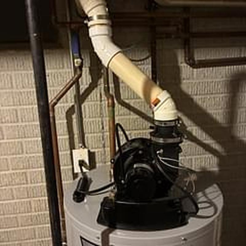 Power vent water heater with pressure switch and pipes Power vent water heater with pressure switch and pipes