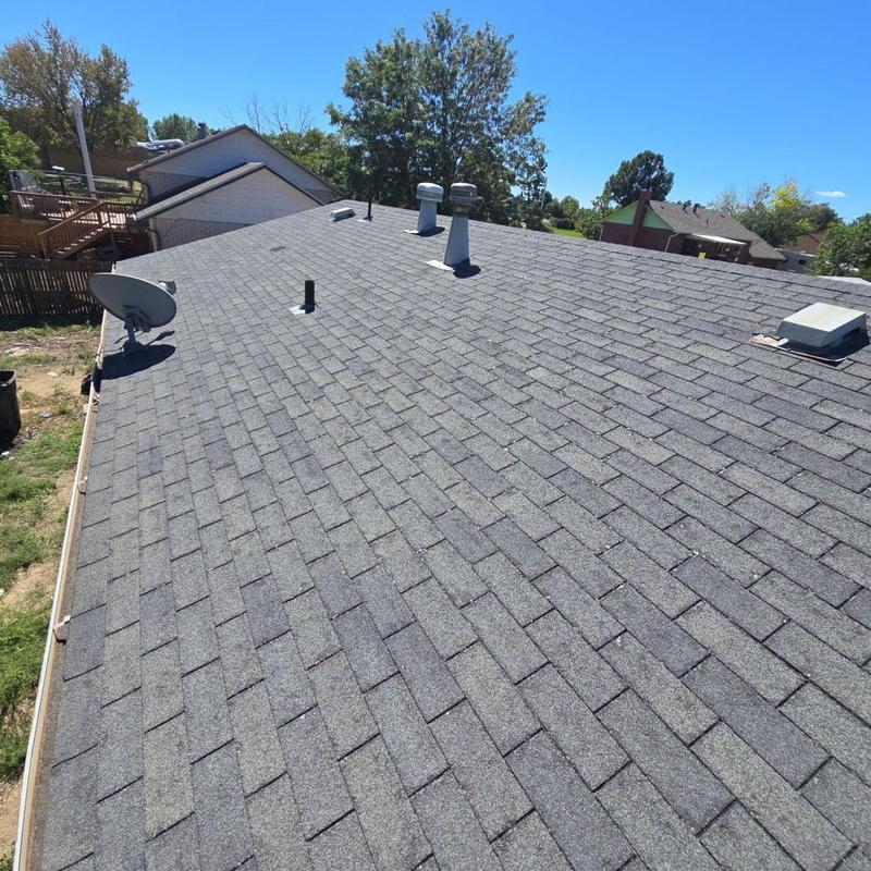 Asphalt shingle roof with vents and satellite dish Asphalt shingle roof with vents and satellite dish