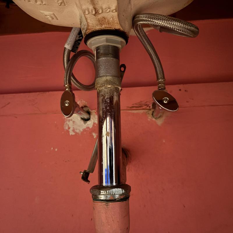 Kitchen sink drain and water supply lines installation