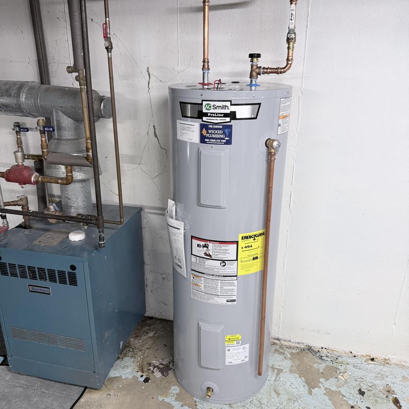 Electric water heater with new copper piping installation Electric water heater with new copper piping installation