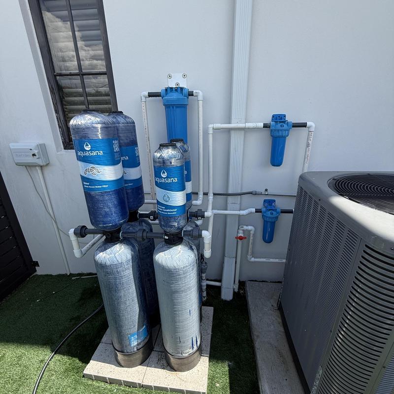 Aquasana whole house water filter and replumbed pipes