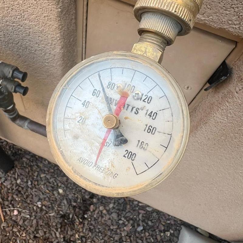 Pressure regulator valve gauge showing pressure reading