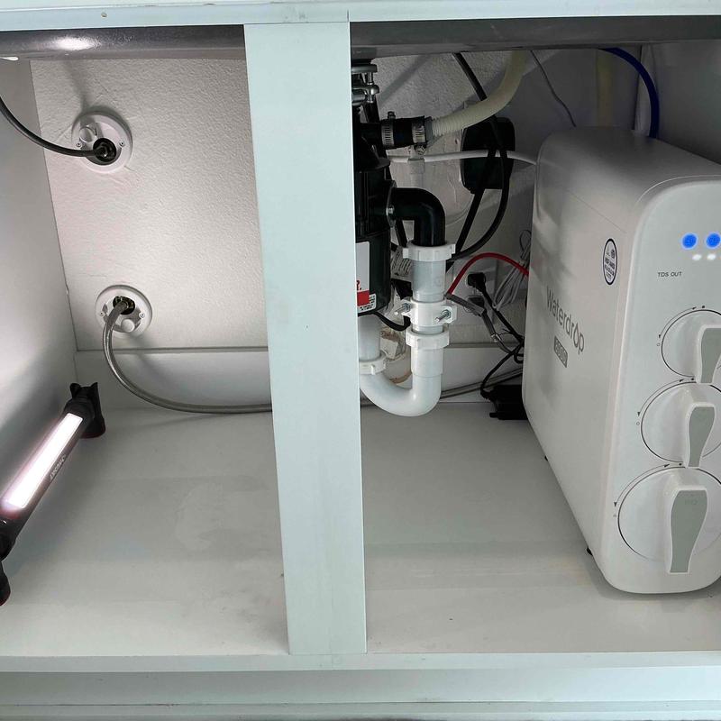 Reverse osmosis system installed under kitchen sink Reverse osmosis system installed under kitchen sink