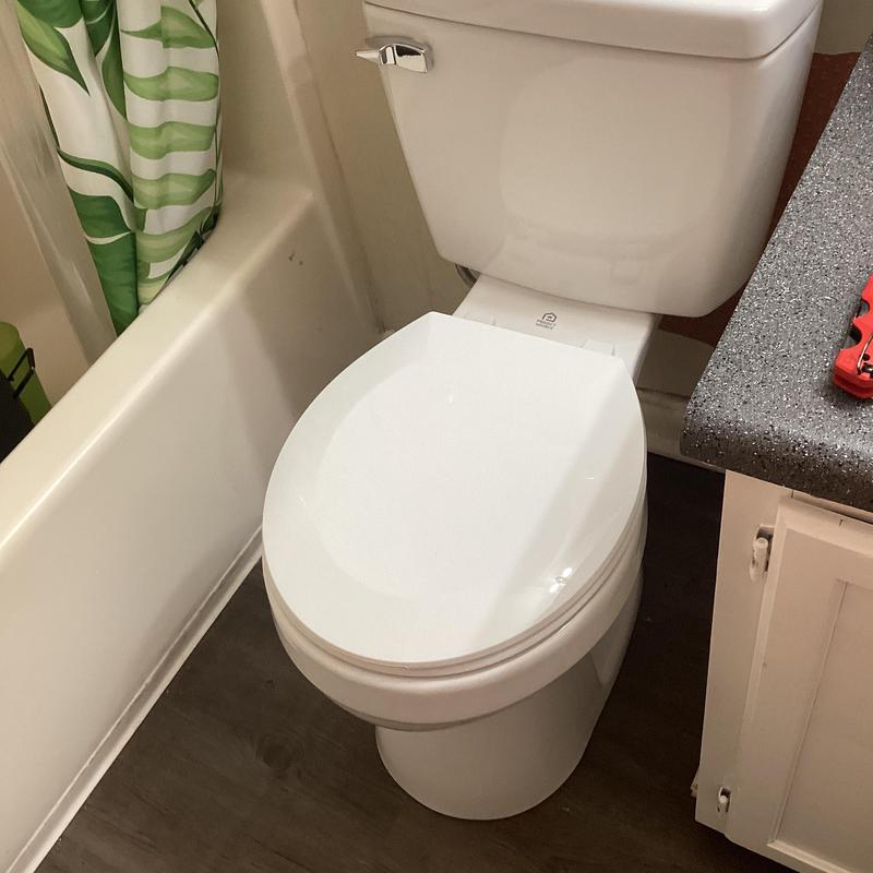 Toilet with new flange repair ring installed