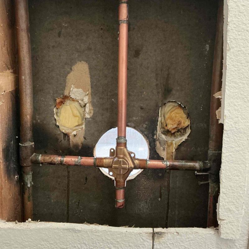 Copper shower valve piping installation in wall cavity Copper shower valve piping installation in wall cavity