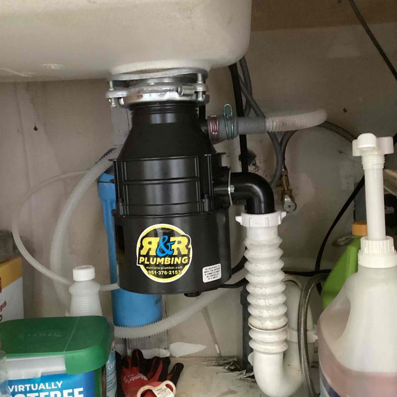 Garbage disposal installation under kitchen sink Garbage disposal installation under kitchen sink