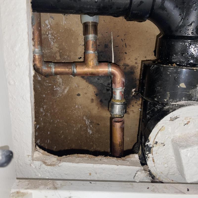 Copper water line with temporary cap inside wall cavity Copper water line with temporary cap inside wall cavity