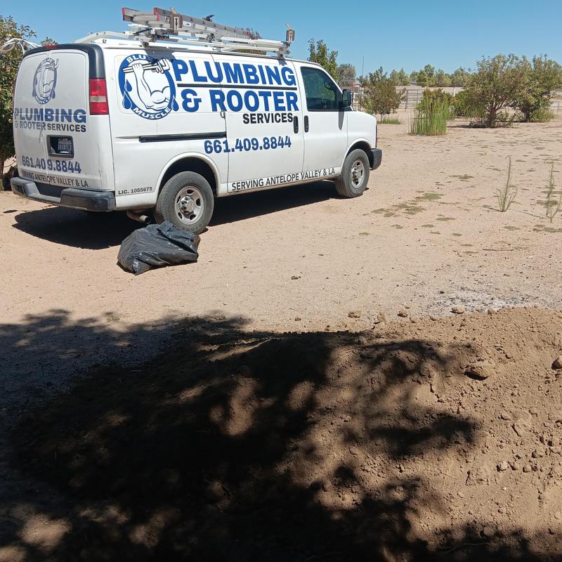 Septic tank riser installation with plumbing van nearby Septic tank riser installation with plumbing van nearby