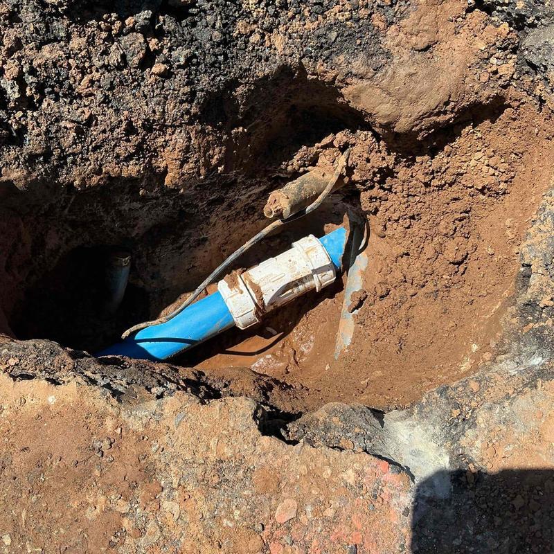 Blue PVC pipe with mechanical coupling installation Blue PVC pipe with mechanical coupling installation