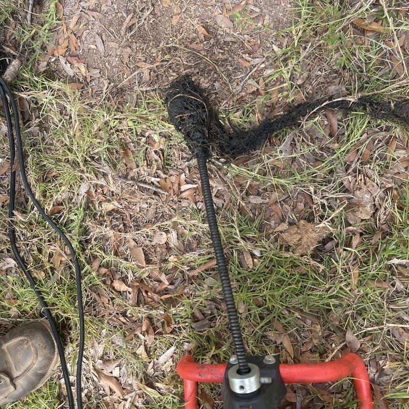 Mainline sewer cable with root obstruction pullout Mainline sewer cable with root obstruction pullout