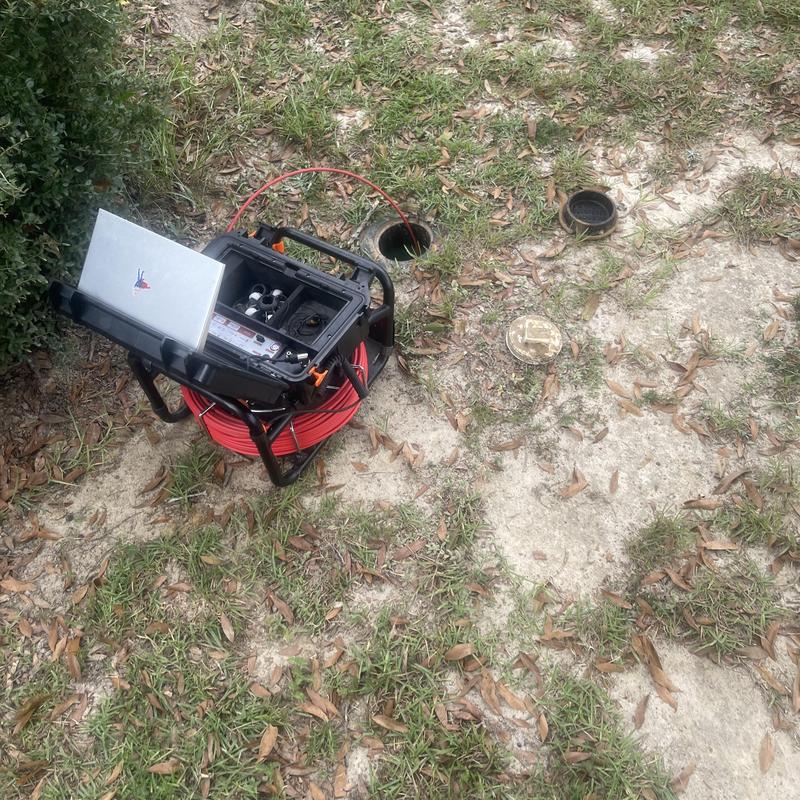 Mainline sewer camera inspection with monitor outdoors Mainline sewer camera inspection with monitor outdoors