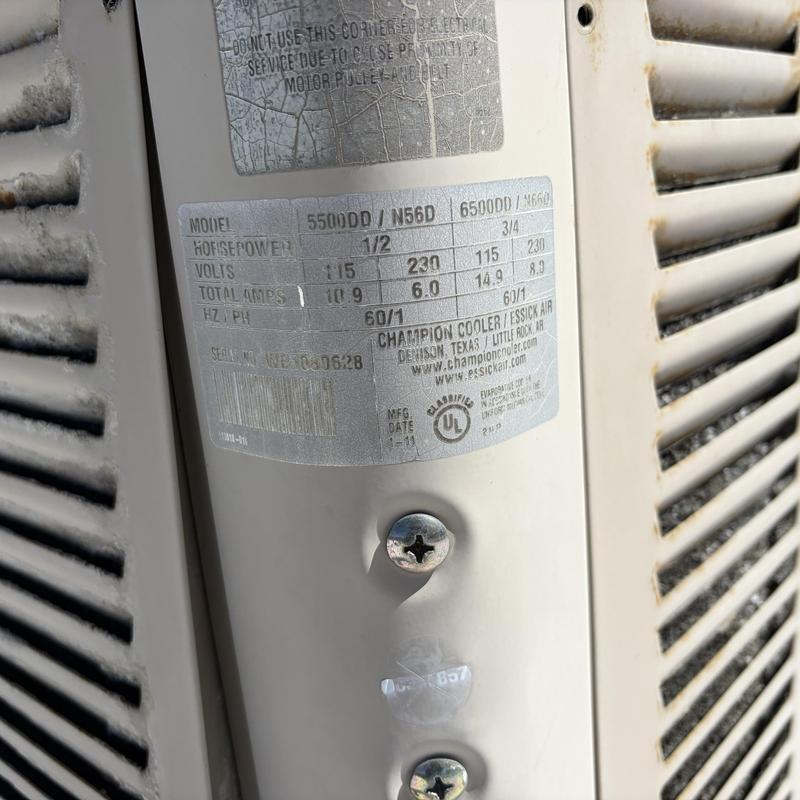 Swamp cooler model label with specs and screws Swamp cooler model label with specs and screws