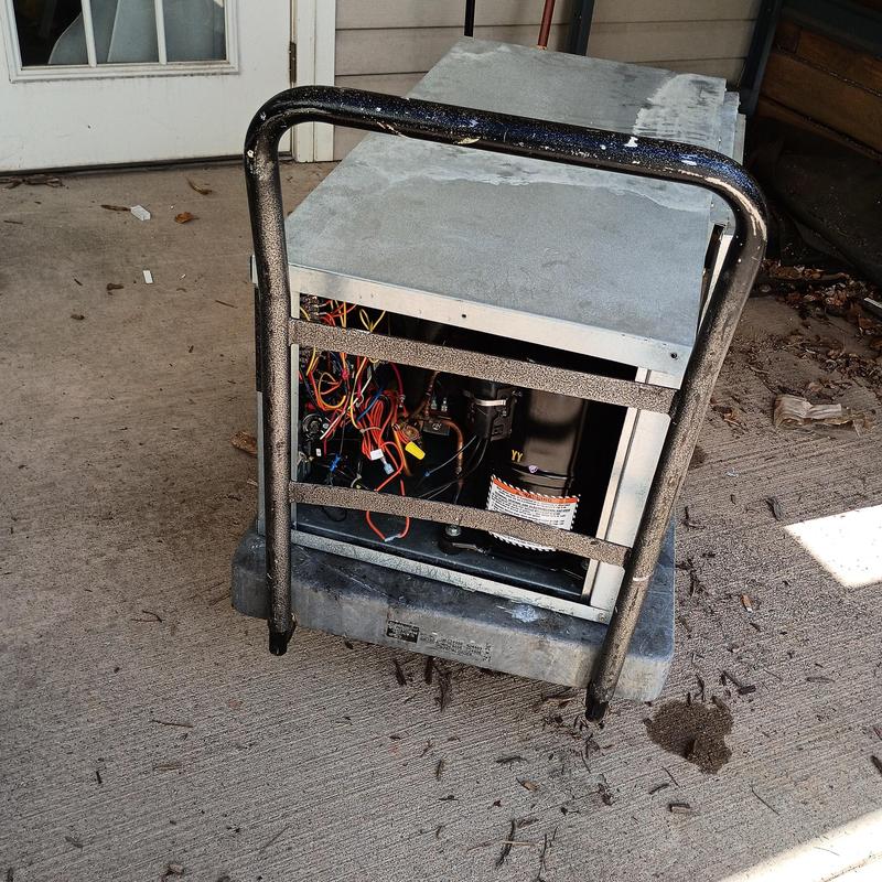 Heat pump compressor unit on service cart outdoors Heat pump compressor unit on service cart outdoors