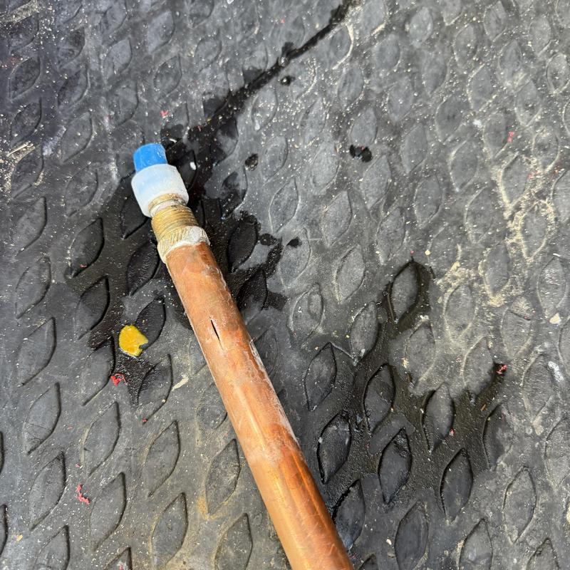 Copper hose bibb pipe with crack and plastic cap