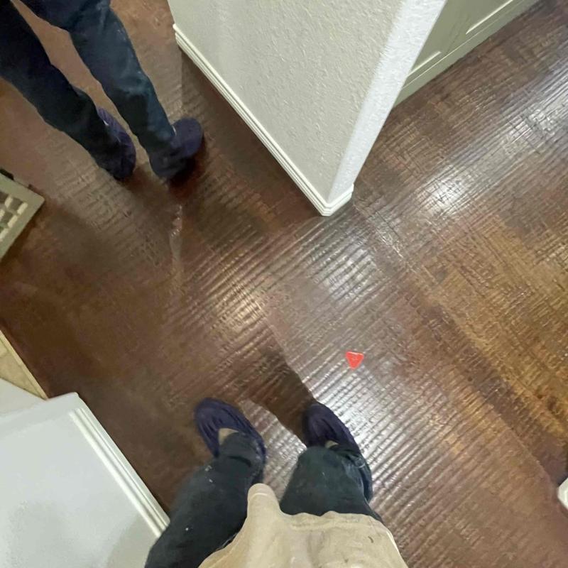 Sewage line belly causing stoppage in hallway floor Sewage line belly causing stoppage in hallway floor