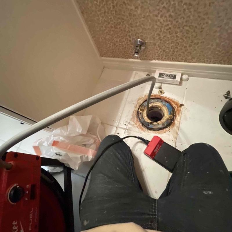Toilet flange and drain line with flex shaft cleaning Toilet flange and drain line with flex shaft cleaning
