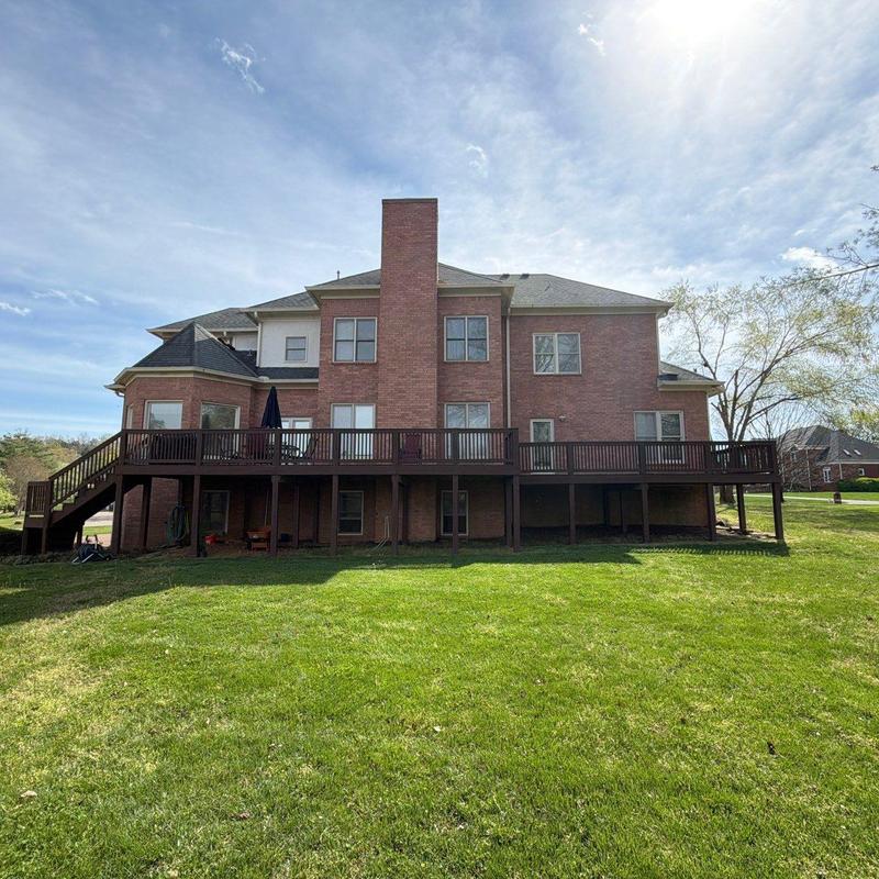 Roof shingles hail damage on large brick home
