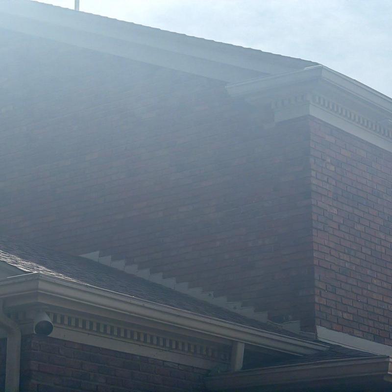Roof shingles hail damage on residential home roof