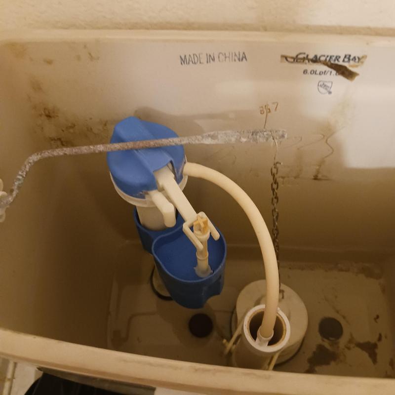 Toilet tank fill valve and flush mechanism inside tank Toilet tank fill valve and flush mechanism inside tank