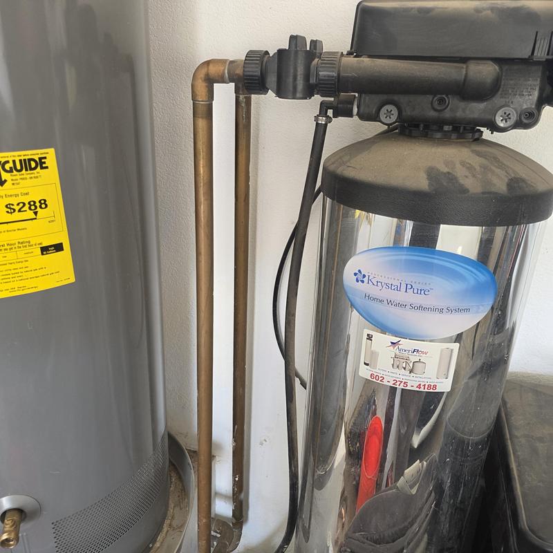 Water softener system with connected copper piping