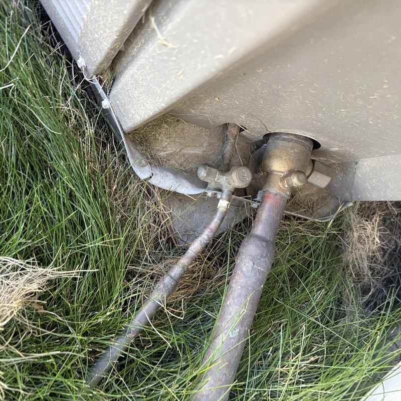 Refrigerant service valves on HVAC outdoor unit Refrigerant service valves on HVAC outdoor unit