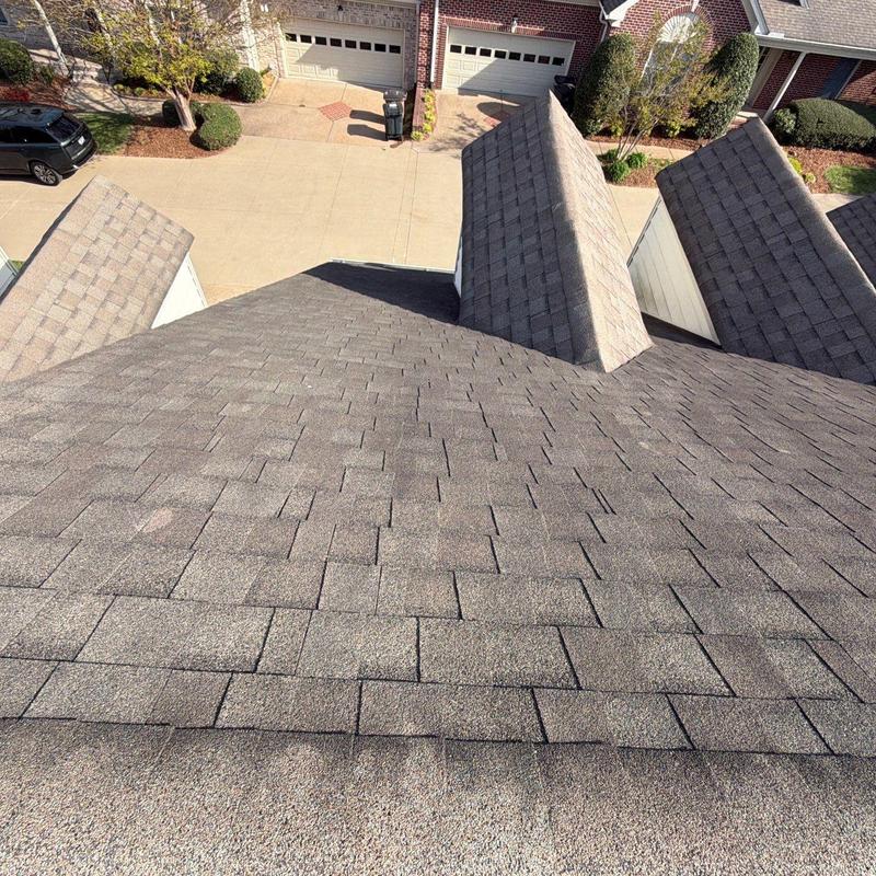 Asphalt shingle roof with hail damage inspection