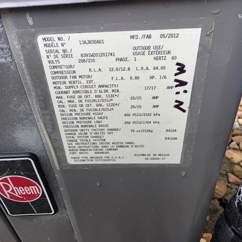 Rheem 13AJN30A01 air conditioner unit label close-up Rheem 13AJN30A01 air conditioner unit label close-up