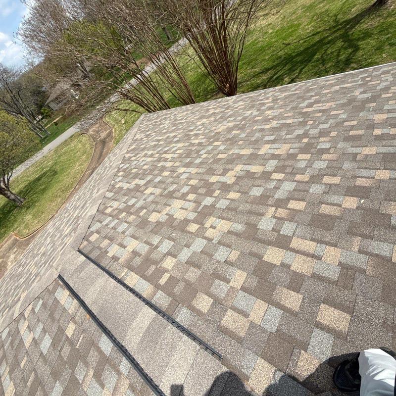 Asphalt shingles roof with hail damage inspection