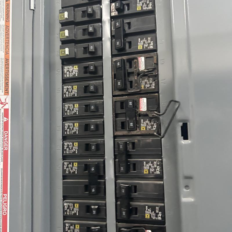 Circuit breaker panel with multiple breaker switches Circuit breaker panel with multiple breaker switches